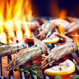 Prawns cooking on barbecue