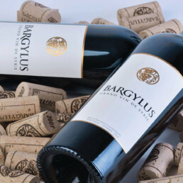 Bargylus wines lying among corks