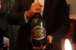 Man holding magnum bottle of Champagne