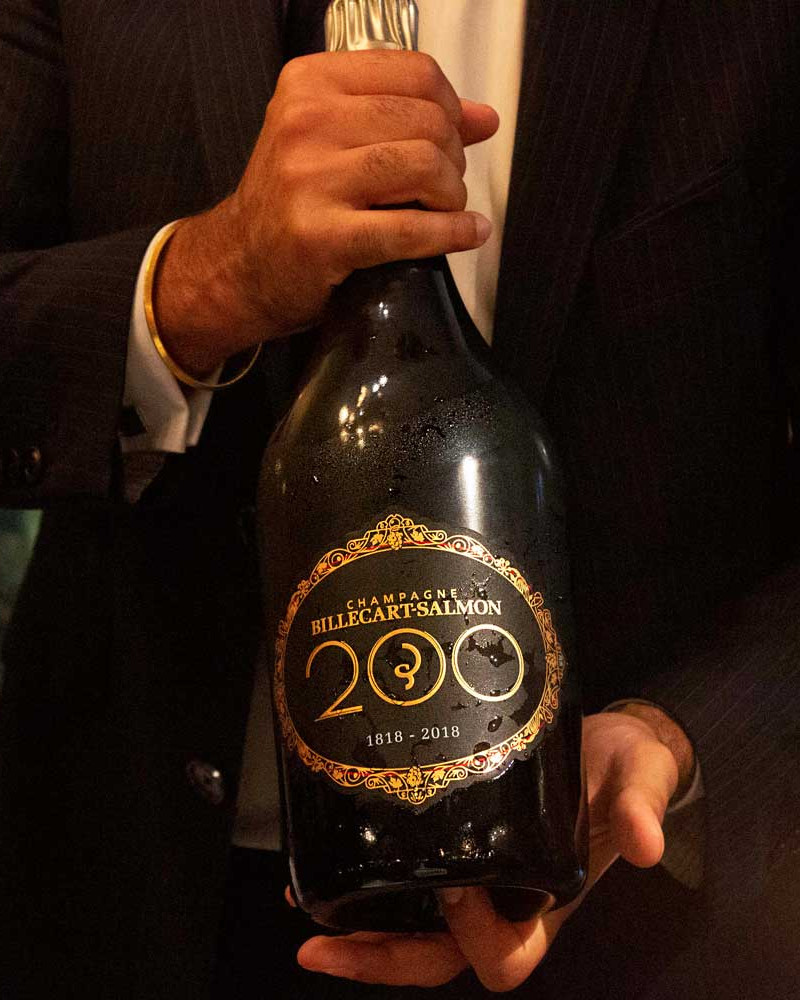 Man holding magnum bottle of Champagne