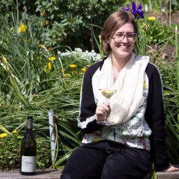 Woman holding wine glass