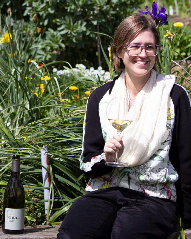 Woman holding wine glass