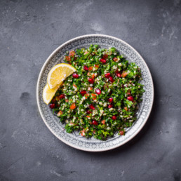 Bowl of salad on table