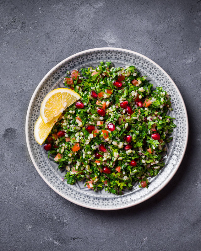 Bowl of salad on table